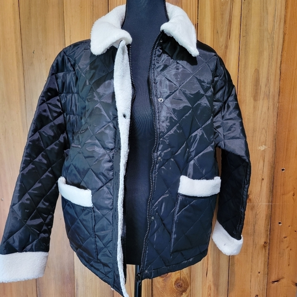 Black Quilted Jacket with White Accents